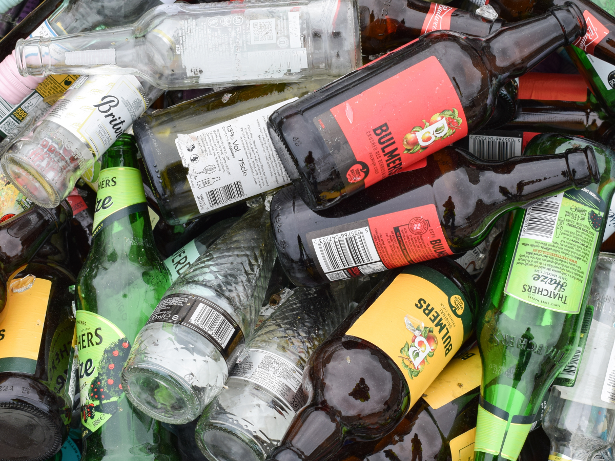 Image of glass bottles awaiting recycling at Nolan Recycling