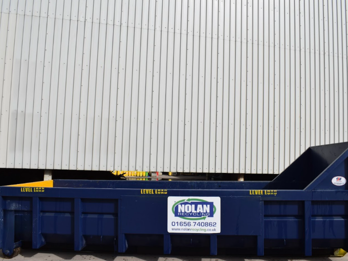 Image of Nolan Recycling 25 yard Roll-On Roll-Off Hookloader Skip on the yard showing size