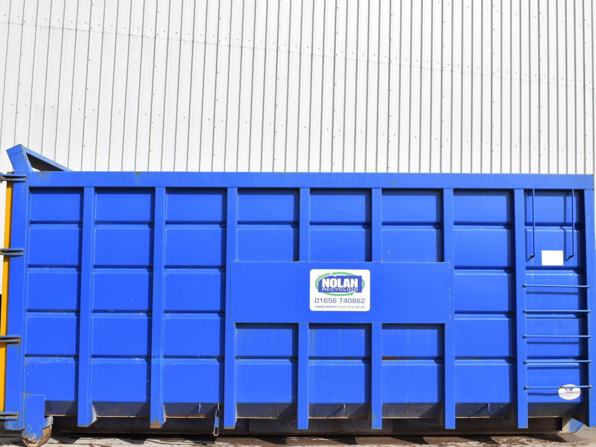 Image of Nolan Recycling 35 yard Roll-On Roll-Off Hookloader Skip on the yard showing size