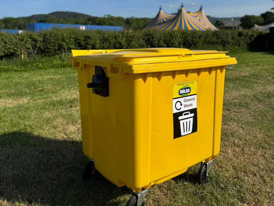 1100l yellow Nolan Recycling wheelie bin at the In It Together Festival 2025